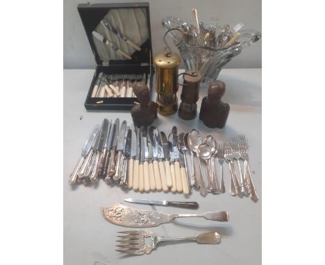 A quantity of Cooper Ludnam silver plated handle knives, a silver handled knife and mixed flatware, two miners lamps to inclu