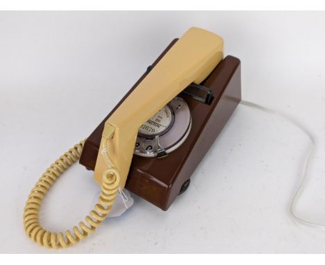 A vintage 'Snowdon' two tone brown telephone, with a British Telecom label (converted and tested, fitted with a new microphon