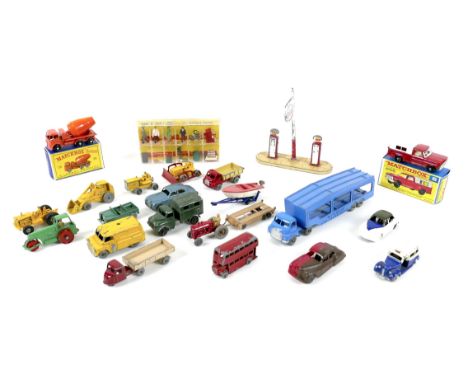 A collection of Dinky, Matchbox, and Lesney model vehicles and accessories, comprising a boxed Dinky Toys 'Railway Station Pe