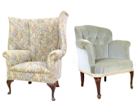 Two vintage armchairs, comprising a barrel backed armchair, upholstered in floral fabric, a/f broken front left leg, 84 by 60