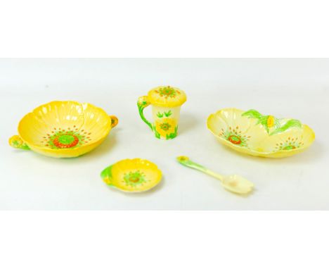 Five pieces of Carlton Ware in the Buttercup pattern, including a chocolate cup with cover, 11.5cm high, a saucer/pin dish, 1