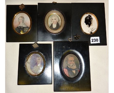 Framed miniature portraits and a silhouette portrait