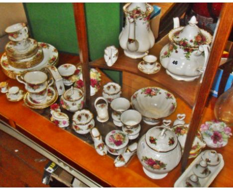 Extensive collection of Royal Albert "Old Country Roses" pattern tableware including teapot, clock, cruet set etc