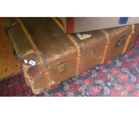 Large composite banded travel trunk with leather corners