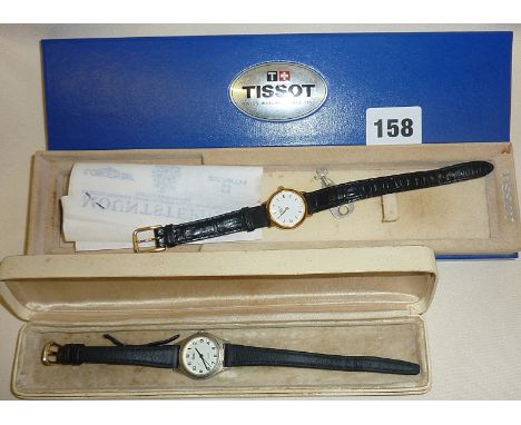 Ladies cased Tissot watch and another ladies Reflex watch