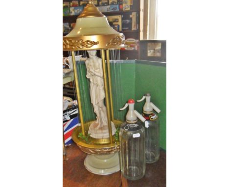 Kitsch Goddess oil rain lamp, circa 1970s/80s, and two glass soda siphons