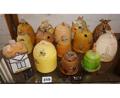 Collection of ten various lidded ceramic honey pots, honeycomb &amp; beehives