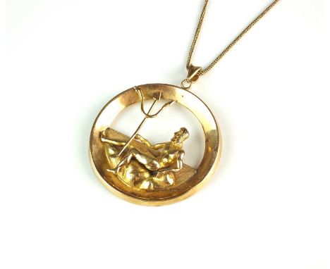 A yellow metal pendant of Poseidon, the God depicted seated holding a trident within circular mount, the reverse stamped 'k18