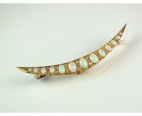 An opal and diamond crescent brooch, designed as thirteen graduated oval cabochon opals interspersed with twenty-six old and 