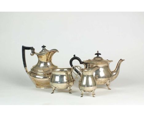 A George V three piece silver tea service, Walker &amp; Hall, Sheffield 1913, each of circular form with cusped rim and raise