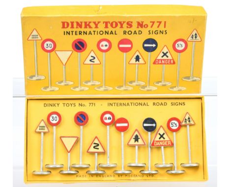 Dinky Toys 771 " International" Road Signs Set - containing 12 pieces - Mainly silver, red and cream - Excellent in a Good Pl