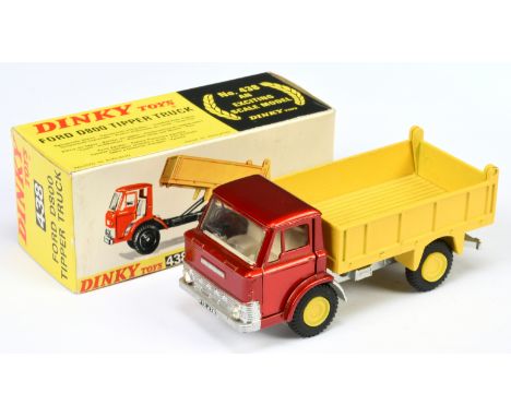 Dinky Toys 438 Ford D800 Tipper Truck - Metallic red cab, bright yellow back, silver chassis, white interior and yellow plast