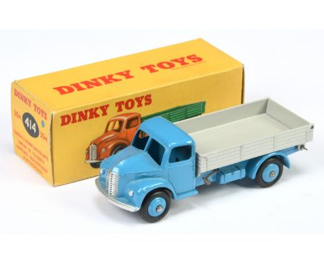 Dinky Toys 414 Dodge Tipping Wagon - Mid-blue cab, chassis and rigid hubs with smooth tyres, light grey tipper and silver tri