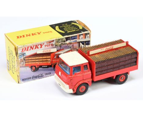 Dinky Toys 402 Bedford TK "Coca Cola" Delivery Truck - Red cab, back and plastic hubs, blue interior, white ribbed roof and f