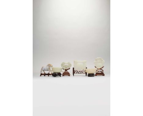 SIX CHINESE JADE ITEMSQING DYNASTY AND LATERComprising: two two-handled cups, two plaques carved as locks, a plaque as a bask