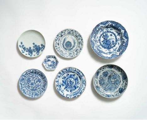 FIVE CHINESE BLUE AND WHITE DISHES 16TH CENTURY AND KANGXIVariously decorated with rockwork, flowers and insects; an hexagona