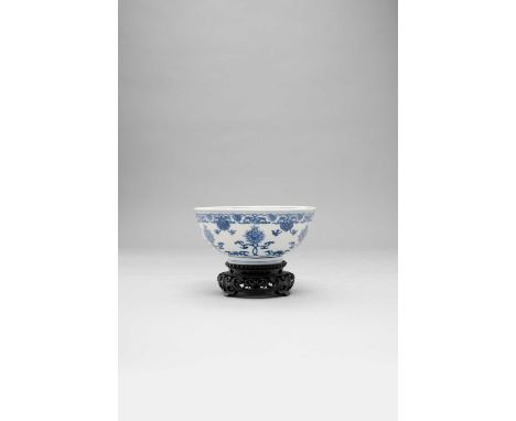 A CHINESE BLUE AND WHITE 'LOTUS' BOWLKANGXI 1662-1722Painted around the exterior with a formal pattern of entwined lotus flow