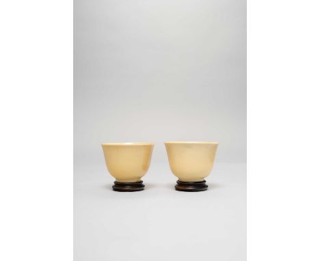 A PAIR OF CHINESE YELLOW ENAMELLED CUPS SIX CHARACTER GUANGXU MARKS AND OF THE PERIOD 1875-1908  With deep rounded sides risi
