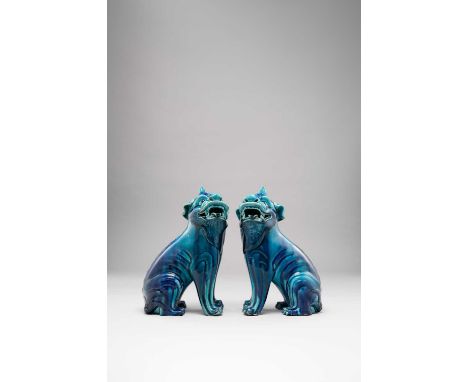 A PAIR OF CHINESE TURQUOISE AND BLUE GLAZED MODELS OF QILINKANGXI 1662-1722The ferocious beasts seated on their haunches, wit