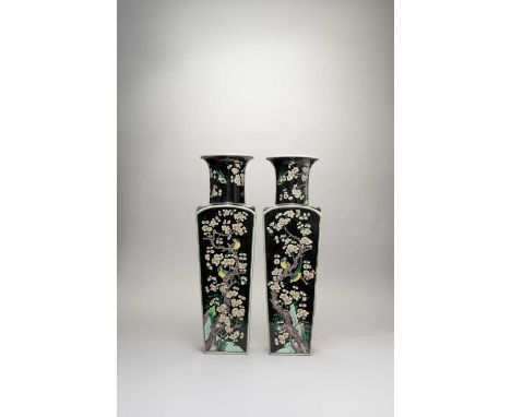 A PAIR OF CHINESE FAMILLE NOIRE VASESLATE QING DYNASTYWith square tapering bodies painted with yellow and green birds perched
