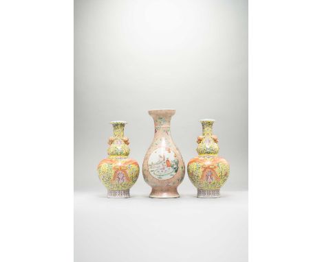 A PAIR OF CHINESE YELLOW GROUND VASES AND ANOTHER VASE REPUBLIC PERIOD  The pair painted with formal lotus scrolls and tied w