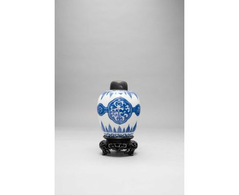 A CHINESE BLUE AND WHITE OVOID JARKANGXI 1662-1722Painted with linked cartouches of scrolling foliage and flowerheads, set wi
