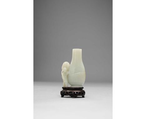 A CHINESE PALE CELADON JADE VASE QING DYNASTY OR LATERThe plain vase with a small figure carrying a large lotus leaf to the s