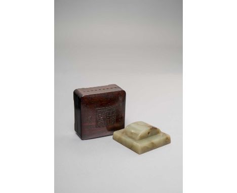 A CHINESE CELADON JADE SQUARE SEALQING DYNASTYCarved with the four seal script characters reading zisun shi chang, contained 