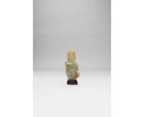 A CHINESE CELADON JADE 'CHILONG AND BAT' FLATTENED BALUSTER VASE QIANLONG 1736-95With twin pierced C-scroll handles, the ston