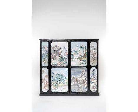 EIGHT CHINESE PAINTED ENAMEL RECTANGULAR PANELS SET INTO A MODERN CABINET18TH/19TH CENTURYEach panel depicting a mountainous 