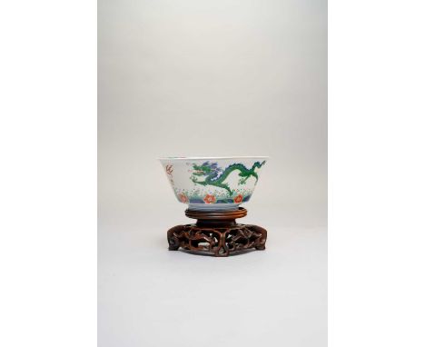A CHINESE WUCAI 'DRAGON' BOWLSIX CHARACTER KANGXI MARK AND OF THE PERIOD 1622-1722The exterior painted with two dragons amids