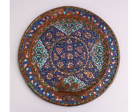 A GOOD 19TH CENTURY SYRIAN ENAMEL CIRCULAR METAL DISH, with raised enamel decoration, 25cm
