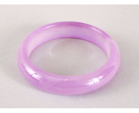 A 19TH / 20TH CENTURY CHINESE CARVED PURPLE AGATE BANGLE, 7.2cm &amp; internal 5.3cm.