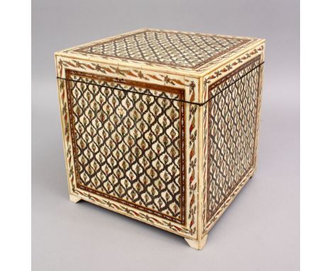 A SUPERB 19TH CENTURY INDIAN IVORY SQUARE BOX, with hinged top, floral design on bracket feet, 9ins.