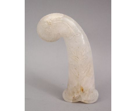 A GOOD INDIAN MUGHAL / ISLAMIC CARVED JADE / CRYSTAL DAGGER HANDLE, with carved formal motif, 13cm.