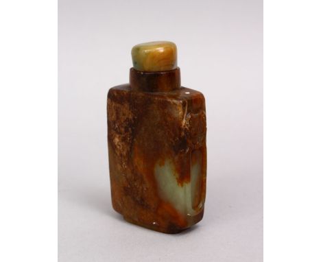 A GOOD 19TH / 20TH CENTURY CHINESE CARVED JADE SNUFF BOTTLE, with a hardstone stopper and moulded handles, 7cm.