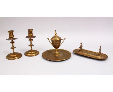 A 19TH CENTURY INDIAN DAMASCUS FOUR PIECE TABLE SET, comprising inkwell, pen holder and a pair of candlesticks.