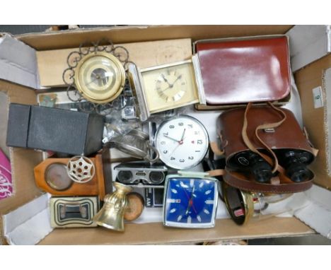 A mixed collection of items to include carriage clocks, vintage alarm clocks: a pair of Delmar binoculars, opera glasses, bar
