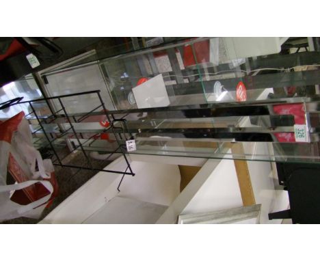 A Chrome modern shop display clothes stand: together with a smaller similar item (2) 