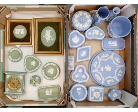 A large collection of Wedgwood jasperware including a mantle clock: wall plates, planter, jug, pin dishes, trinket boxes etc 