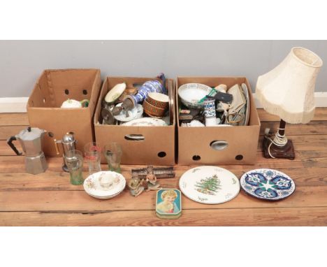 Three boxes of miscellaneous. Including carved wooden table lamp, Royal Doulton dinnerware, ceramic figures, etc.  