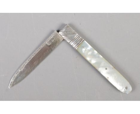 A Georgian folding fruit knife with mother of pearl scales and silver blade.  