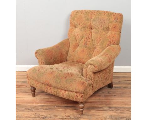 A three piece suite consisting of large sofa, arm chair and footstool.  