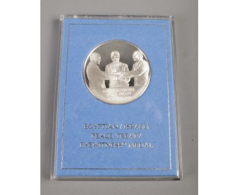 Franklin Mint; A Limited Edition Egyptian/Israeli Peace Treaty Eyewitness Medal struck in sterling silver. With case, certifi