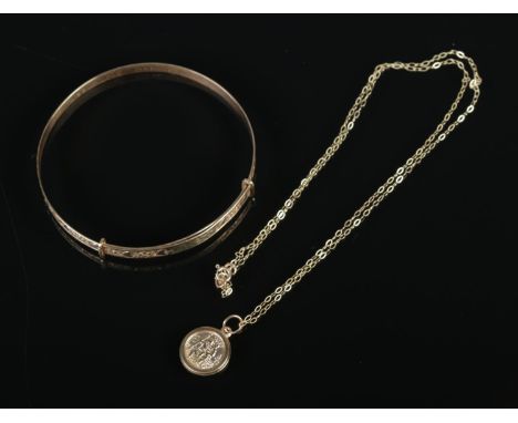 A 9ct christening bangle inscribed Abbey Love Grandad (3.84g) along with 9ct chain (0.37g) with yellow metal pendant.  