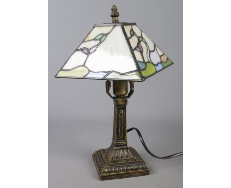 A small Tiffany style table lamp.  