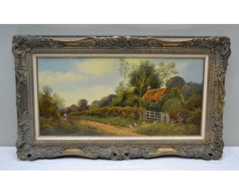 E. COLE A late 19th century oil on canvas study of a lone cottage, with chickens by the gate and a solitary figure on the pat