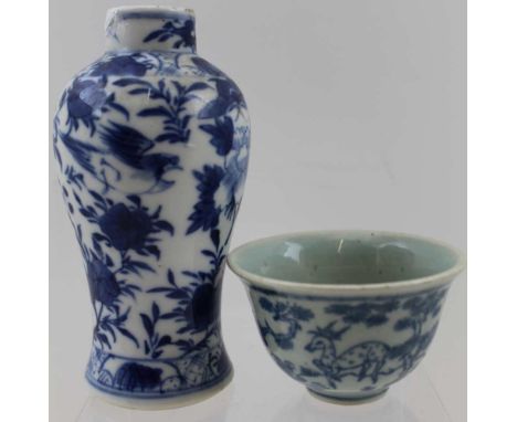 A CHINESE MING DYNASTY CERAMIC WINE CUP, blue &amp; white, painted with a deer and heron in landscape, the rim 8cm in diamete