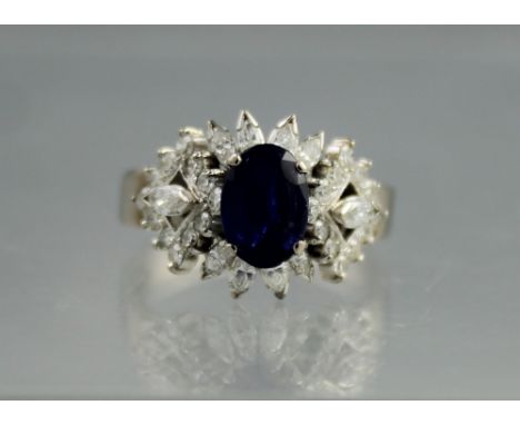 18CT WHITE GOLD, SAPPHIRE AND DIAMOND CLUSTER RING.  Ring size O.(B.P. 24% incl. VAT)   CONDITION REPORT:  Chip to edge of sa