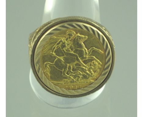 GEORGE V GOLD SOVEREIGN 1911 in engraved and pierced 9ct gold ring mount.  14.8g.(B.P. 24% incl. VAT)